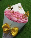 Ramo de flores Eternas Rosadas con Detalles dorados